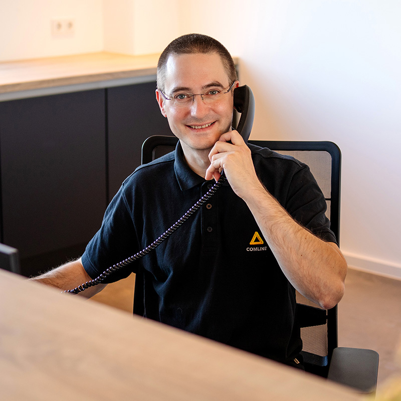 COMLINE-Mitarbeiter im Back-Office